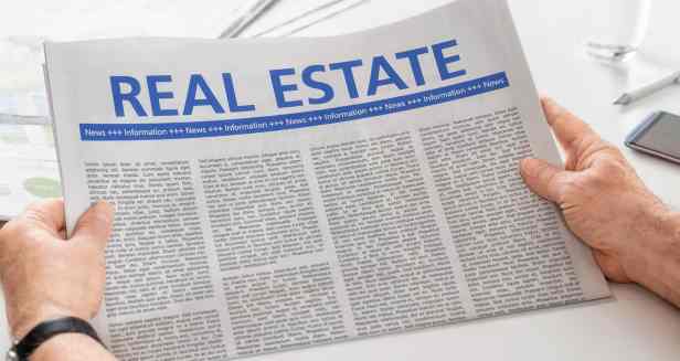 bigstock-Man-Reading-Newspaper-With-The-172516742-real-estate-2.jpg